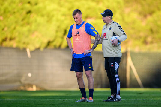 Victor Edvardsen and assistant coach Peter Wettergen of the