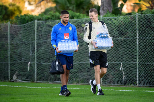 Omar Faraj and goalkeeper coach Maths Elfvendal of the