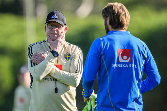 head coach Janne Andersson and Christoffer Nyman of the