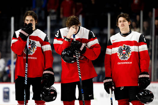 Players of Austria look dejected