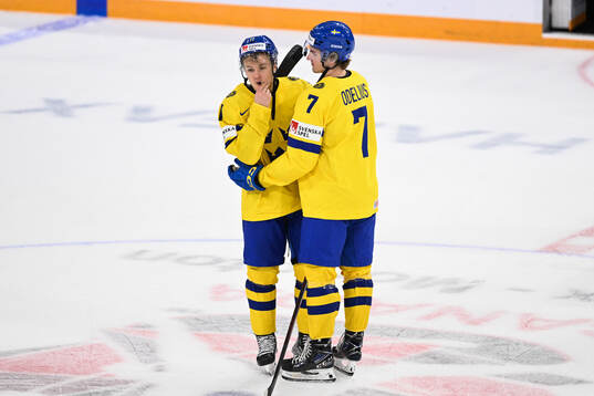 Fabian Lysell and Calle Odelius of Sweden look dejected