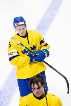 Adam Engström of Sweden looks dejected