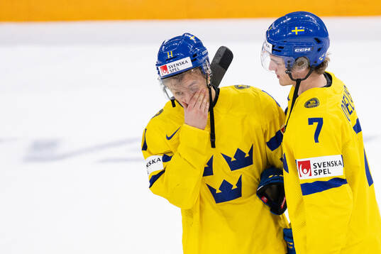 Fabian Lysell and Calle Odelius of Sweden looks dejected