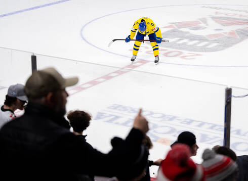 Fabian Lysell of Sweden looks dejected afer the 2023 IIHF