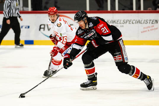 Troja/Ljungbys Dennis Fröland och Nybros Janne Väyrynen