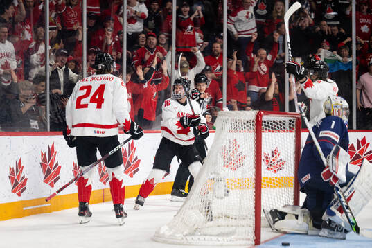 Connor Bedard of Canada celebrates the 2-1 goal