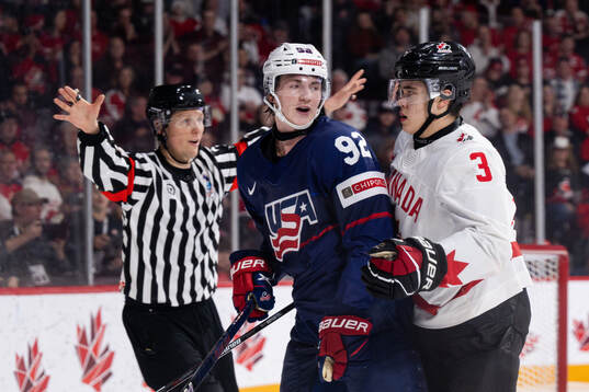Logan Cooley of USA and Olen Zellweger of Canada