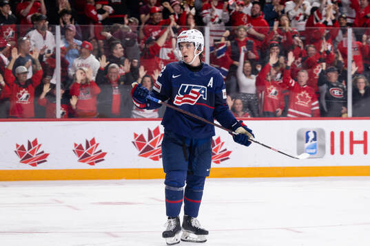 Sean Behrens of USA looks dejected