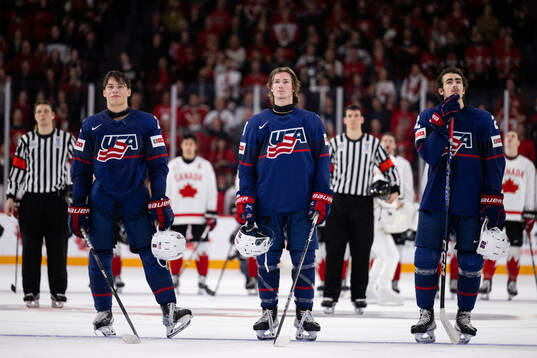 Players of USA look dejected afterthe 2023 IIHF World