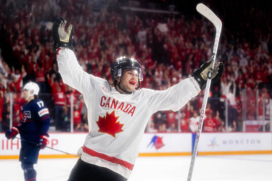 Joshua Roy of Canada celebrates the 2-6 goal
