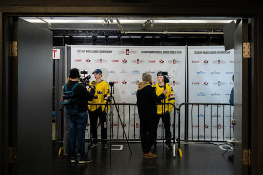 Goaltender Carl Lindbom and Victor Stjernborg of Sweden