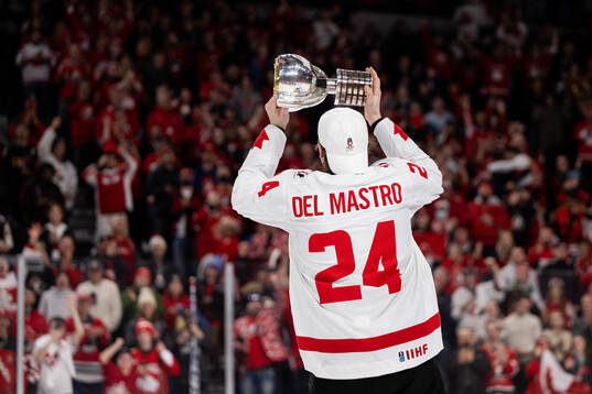 Ethan Del Mastro of Canada celebrate with the trophy