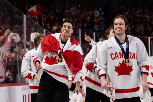 Tyson Hinds of Canada celebrates