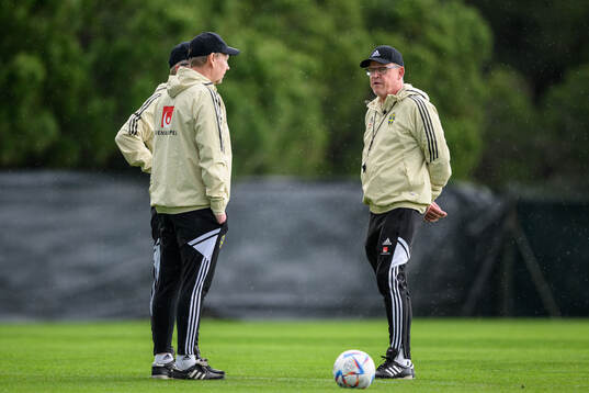 assistant coach Peter Wettergen and head coach Janne
