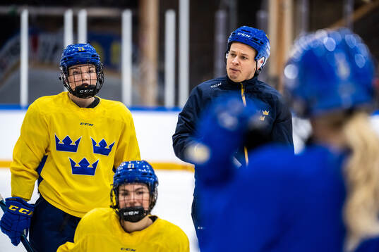 Emma Goding and head coach Andreas Karlsson of Sweden at a