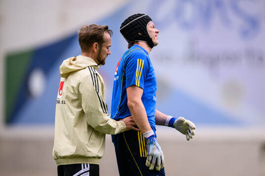 Physiotherapist Christian Andersson and goalkeeper Jacob