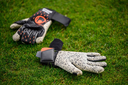 A pair of golakeeper gloves at a training session
