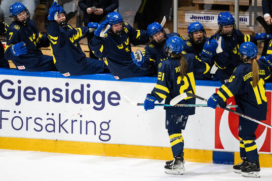 Emma Rehn of Sweden celebrates with her team mates