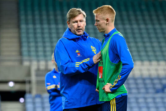 Assistant coach Peter Wettergren and Hugo Larsson