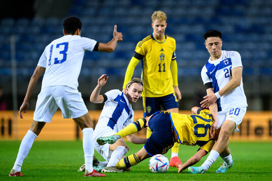 Santeri Väänänen and Kai Meriluoto of Finland and Yasin