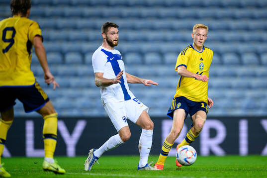 Arttu Hoskonen of Finland and Hugo Larsson of Sweden