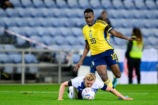 Richard Jensen of Finland and Joel Asoro of Sweden