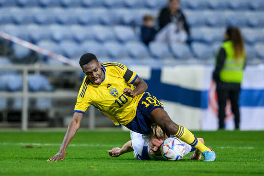 Joel Asoro of Sweden and Richard Jensen of Finland