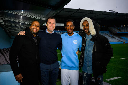 Mohamoud Dahir, sportchef Daniel Andersson, Taha Ali och