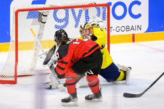 goaltender Felicia Frank of Sweden and Morgan Jackson of