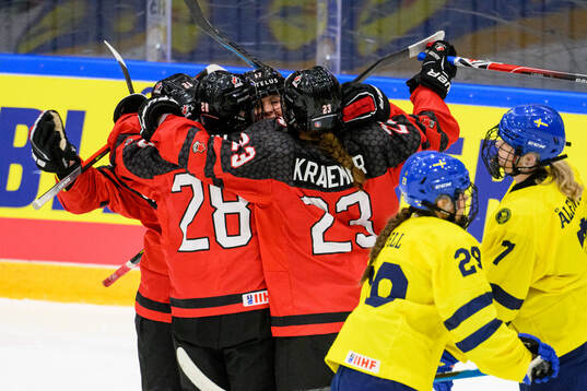 Alex Law of Canada celebrates