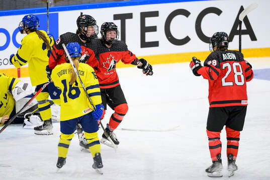 Caitlin Kraemer of Canada celebrates