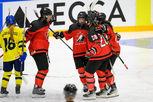 Caitlin Kraemer of Canada celebrates