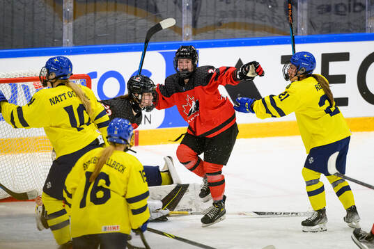 Caitlin Kraemer of Canada celebrates