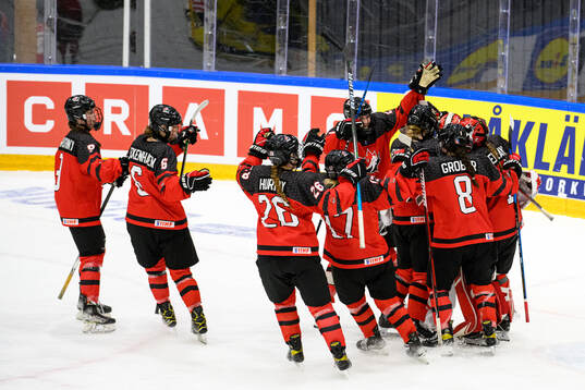 Players of Canada celebrate