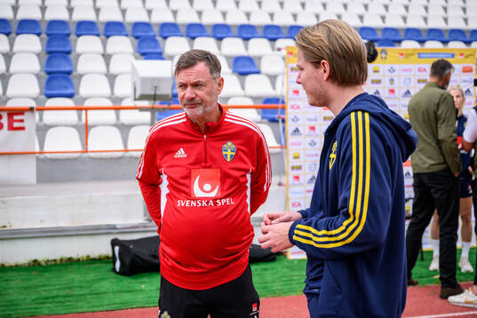 head coach Peter Gerhardsson and press officer Fredrik