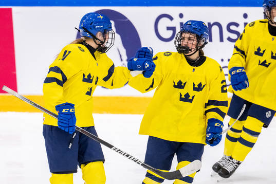 Ella Hellman and Emma Rehn of Sweden celebrate