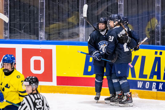 Sinna Varjonen and Erica Korhonen of Finland celebrate the