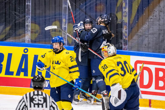 Sinna Varjonen and Erica Korhonen of Finland celebrate the