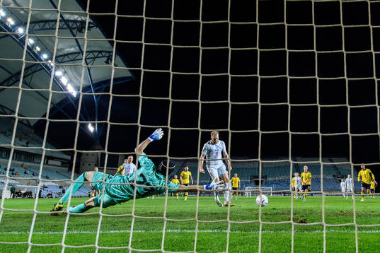 Sveinn Aron Gudjohnsen of Iceland scores 0-1