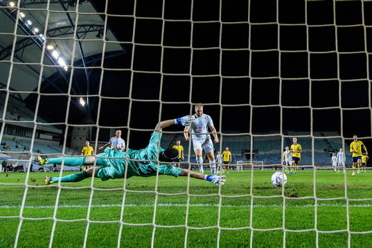 Sveinn Aron Gudjohnsen of Iceland scores 0-1