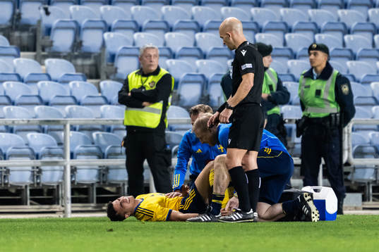 Yasin Ayari of Sweden in pain