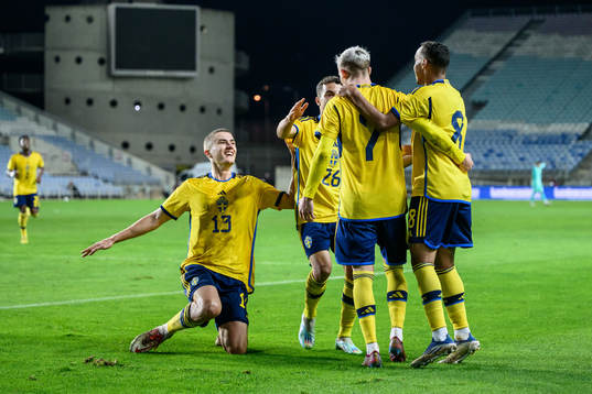Jacob Ondrejka of Sweden celebrates with teammates