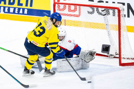 Mira Hallin of Sweden and goaltender Livia Debnarova of