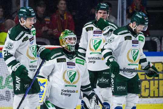 Färjestads Joel Nyström, målvakt Dennis Hildeby, och