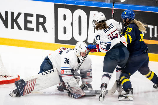 Mira Hallin of Sweden against goaltender Annelies Bergmann