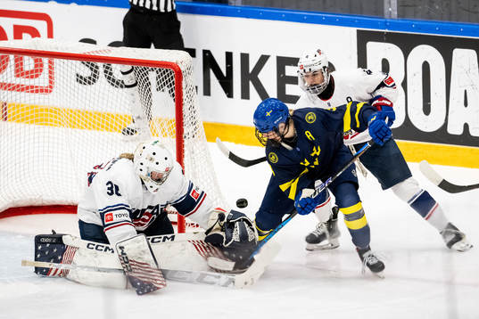 Mira Jungåker of Sweden against goaltender Annelies