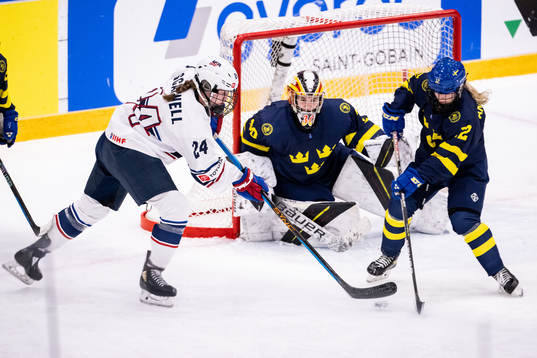 Margaret Scannell of USA against goaltender Felicia Frank
