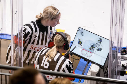 The referees look at the 2-2 goal by USA