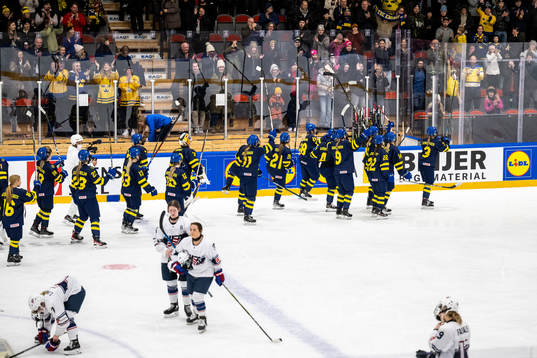 Players of Sweden celebrate