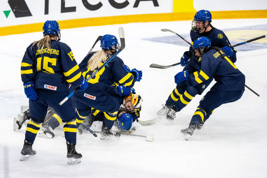Players of Sweden celebrate